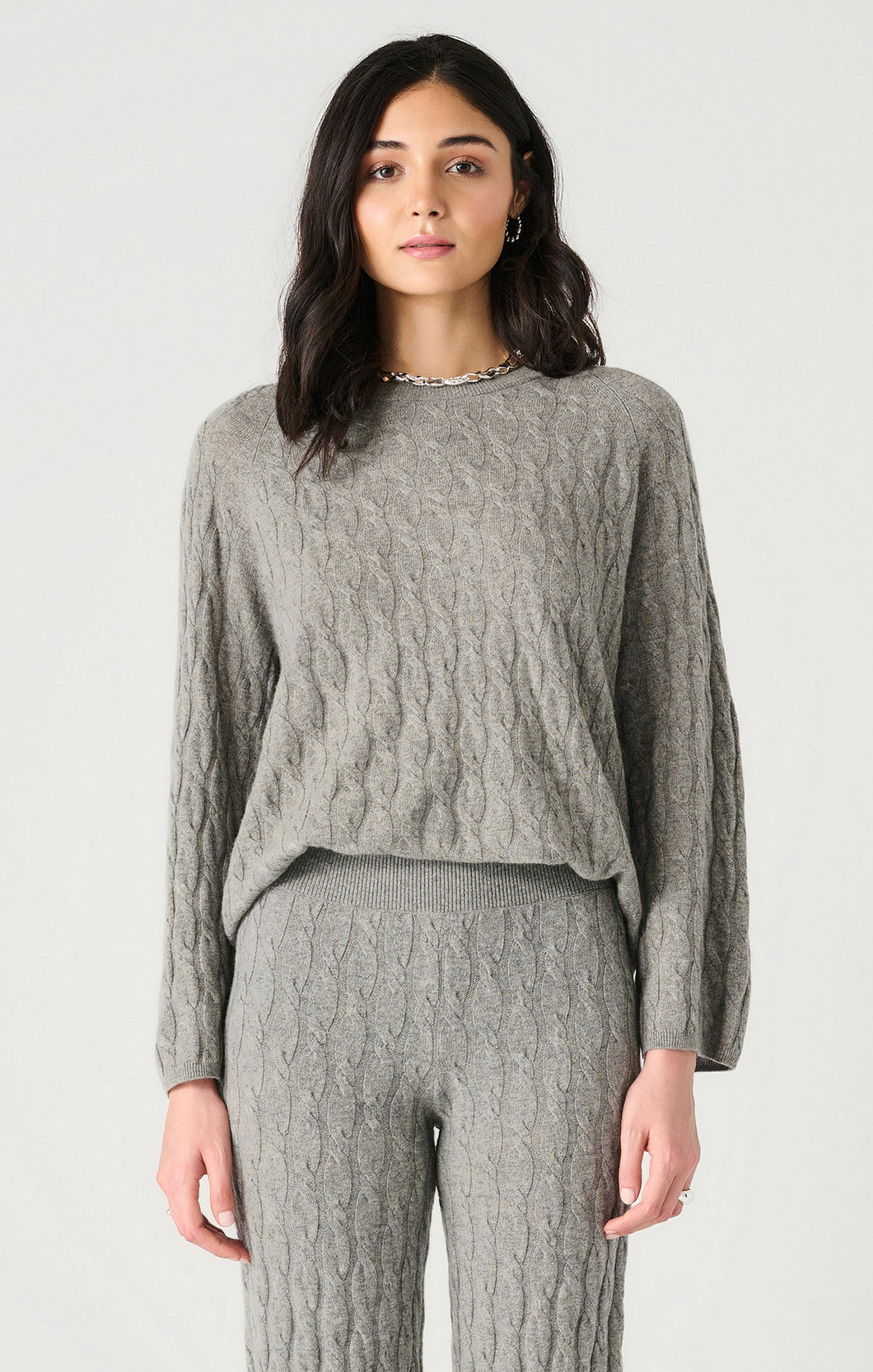 Grey cable knit sweater suit with pants. Dex